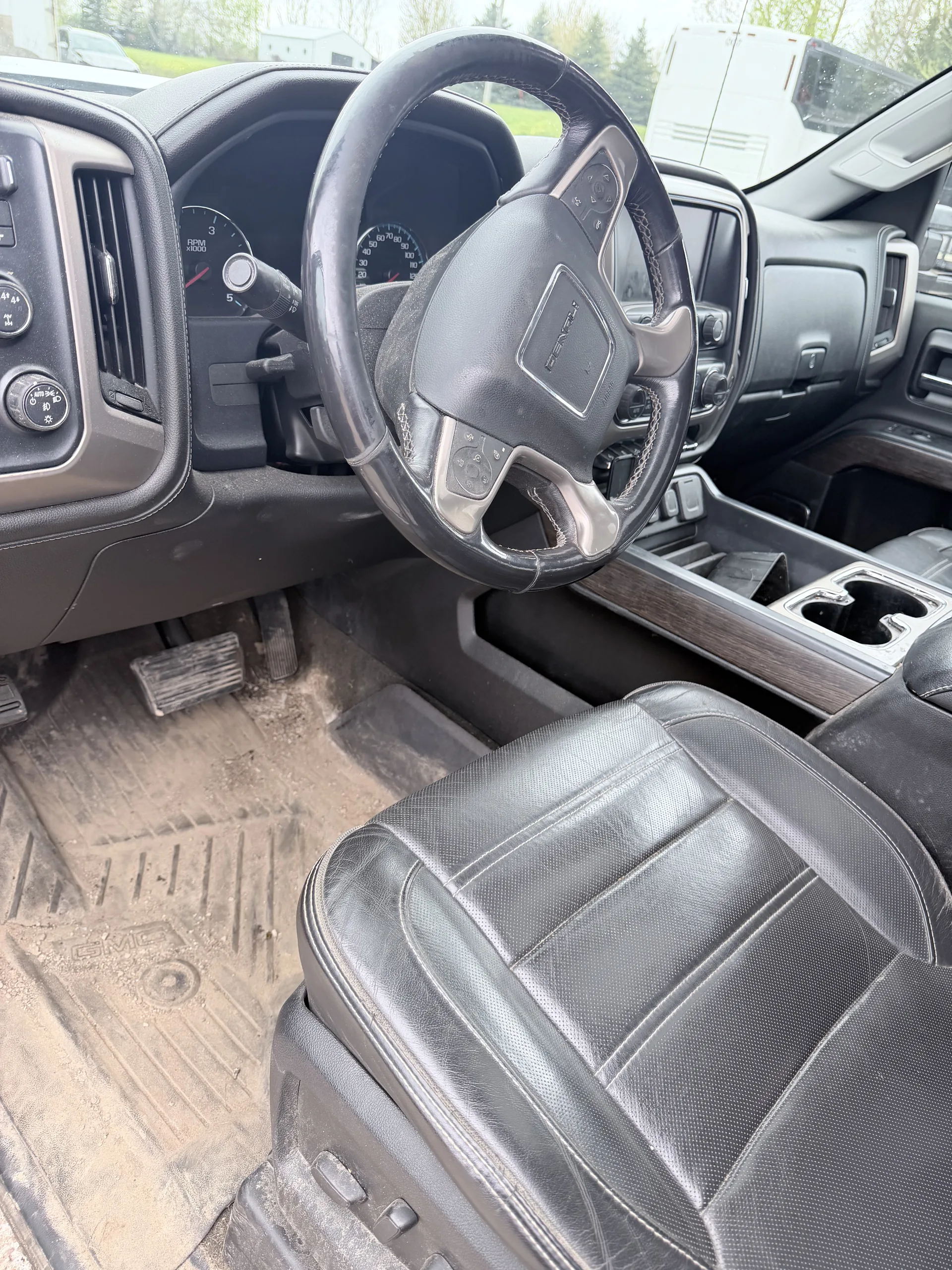GMC Sierra interior before — muddy