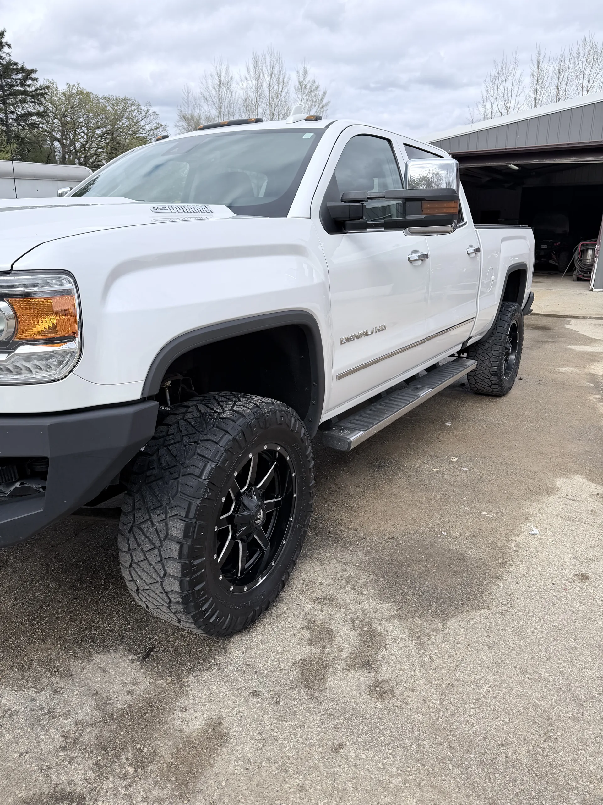 White GMC Sierra 2500 HD side view